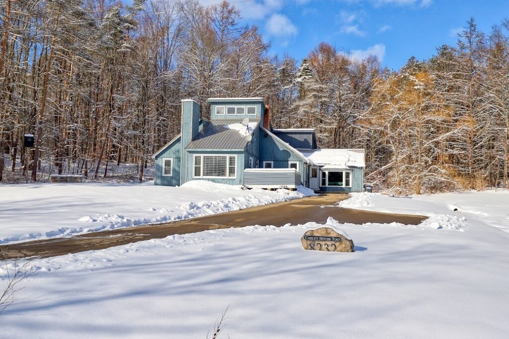 carley house outside with snow on ground